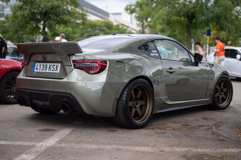 Modified sports car with custom wheels